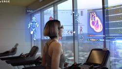A side view of a person on a treadmill wearing glasses with augmented reality screens in front of them. One with a view of a human heart.