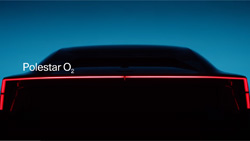 A backlit image shows the shadowy back of a sports car with thin red LED lights across the top