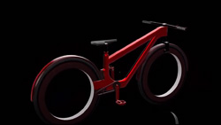 A red spokeless ebike bicycle.