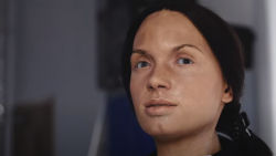 a closeup of a life-like humanoid robot